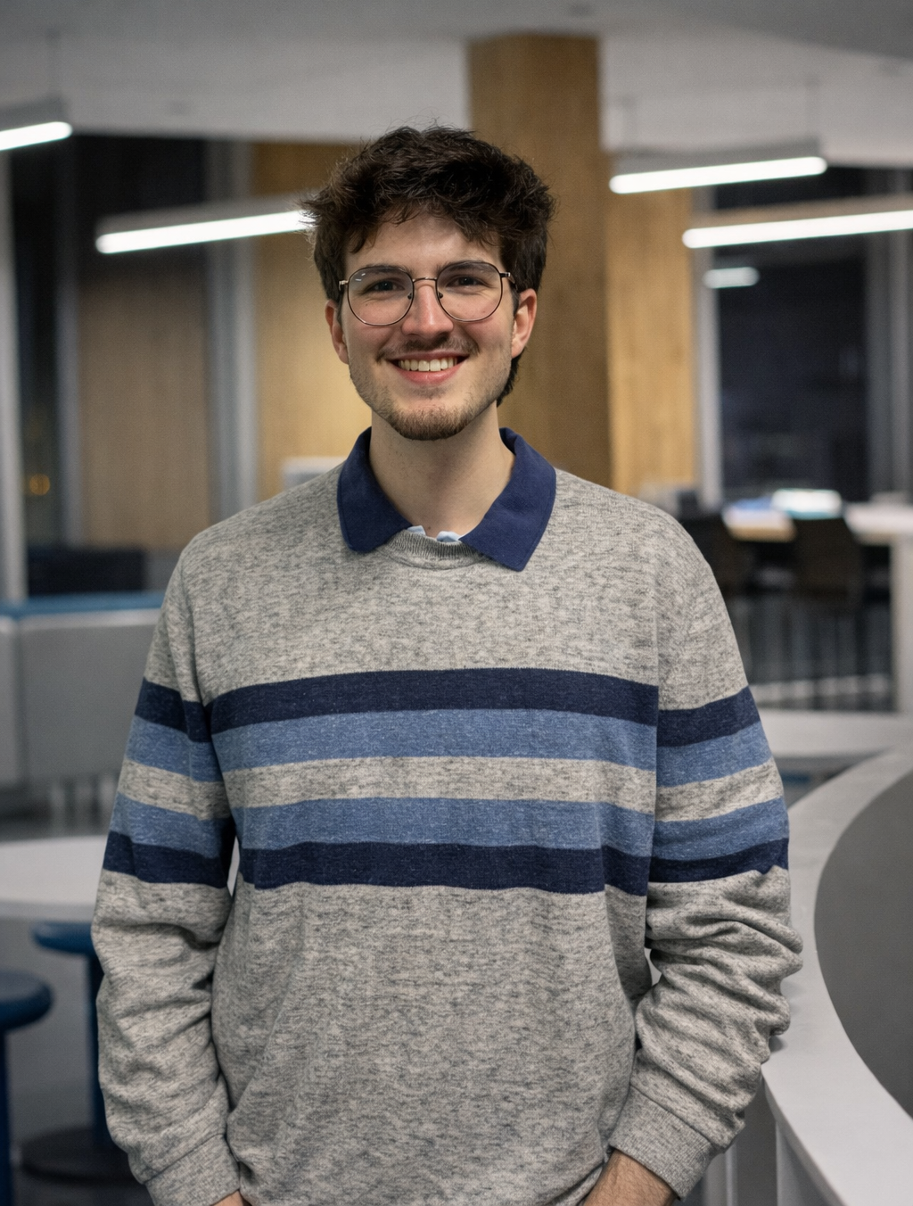 Young man in modern indoor setting